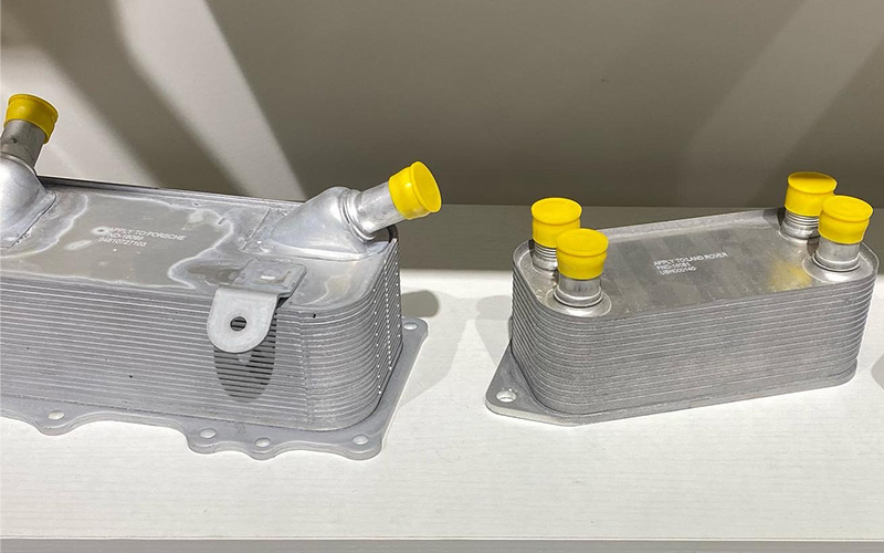 Various engine oil cooler types for heavy-duty and passenger vehicles