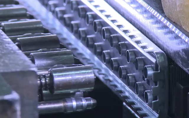 Mechanical radiator tube flaring operation at wholesale radiator factory