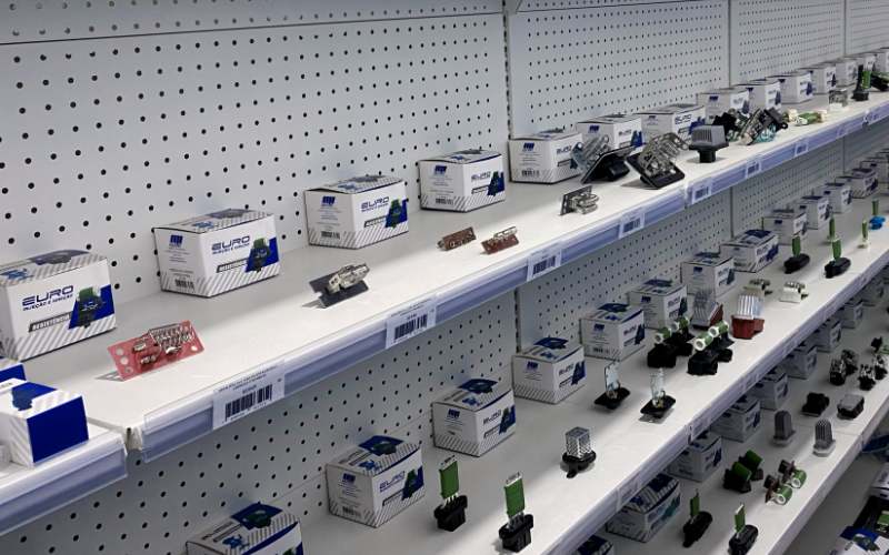 Premium aftermarket blower resistor units in branded and neutral packaging ready for international shipment.