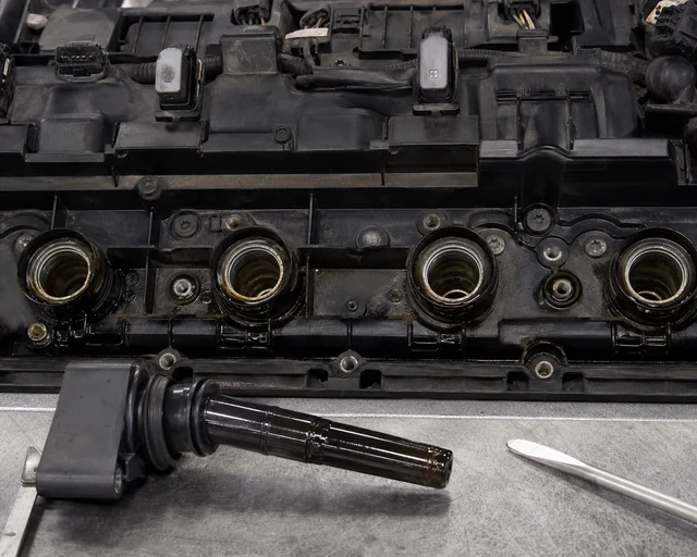 Spark plug tube oil evidence from valve cover gasket leakage