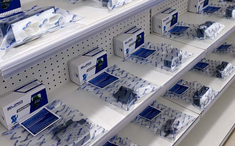 High-performance cooling fan motors and resistors featured in a professional product showroom.