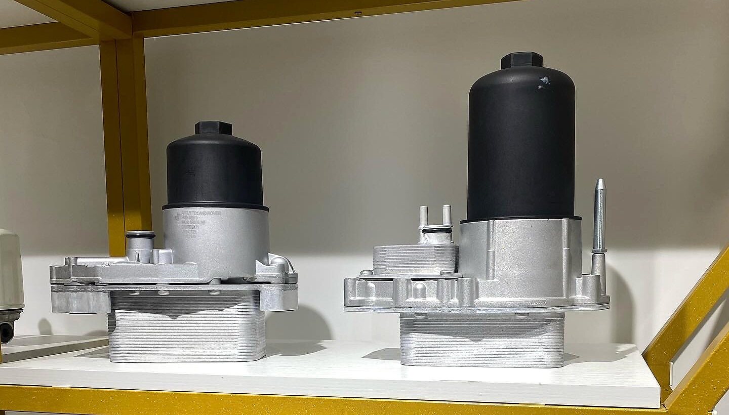 Real oil cooler assemblies displayed for condition review