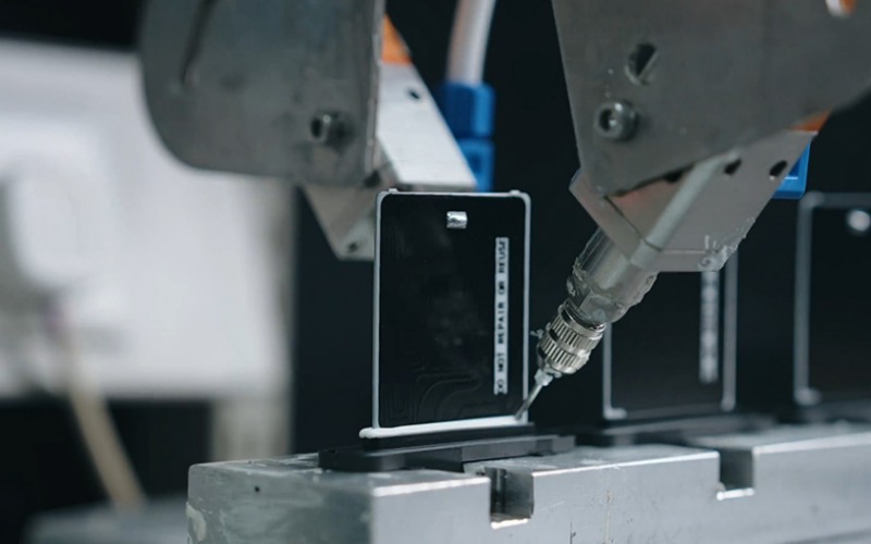 Automated CNC dispensing and precision welding system for blower motor resistor circuit stability.