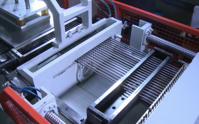 Mechanical radiator tube expanding process at radiator factory